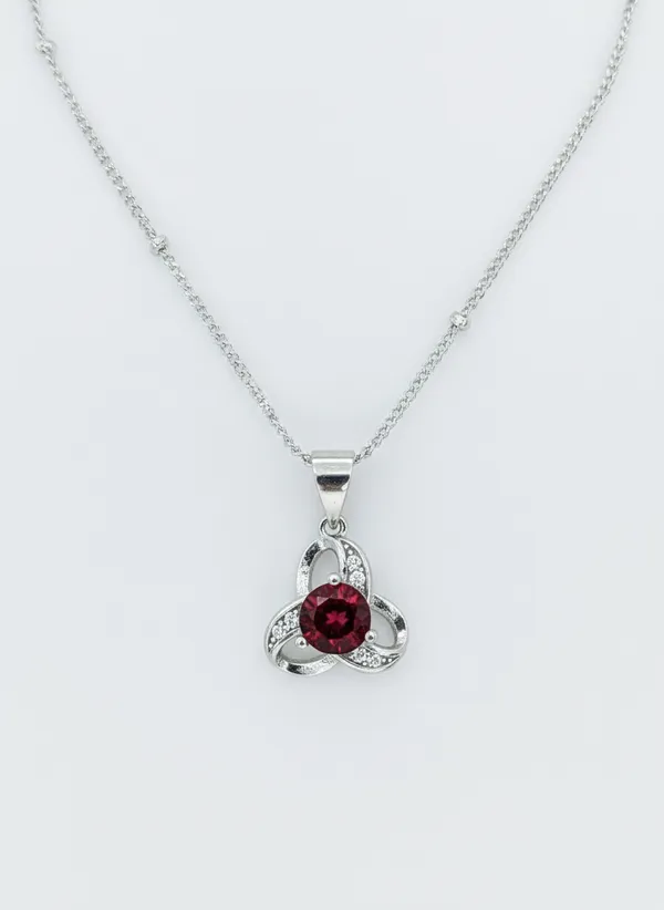 Tri_Knot_Pendant_With_Deep_Red_Zircon_Elegant_Designer_Jewellery_For_Women_925_Sterling_Silver